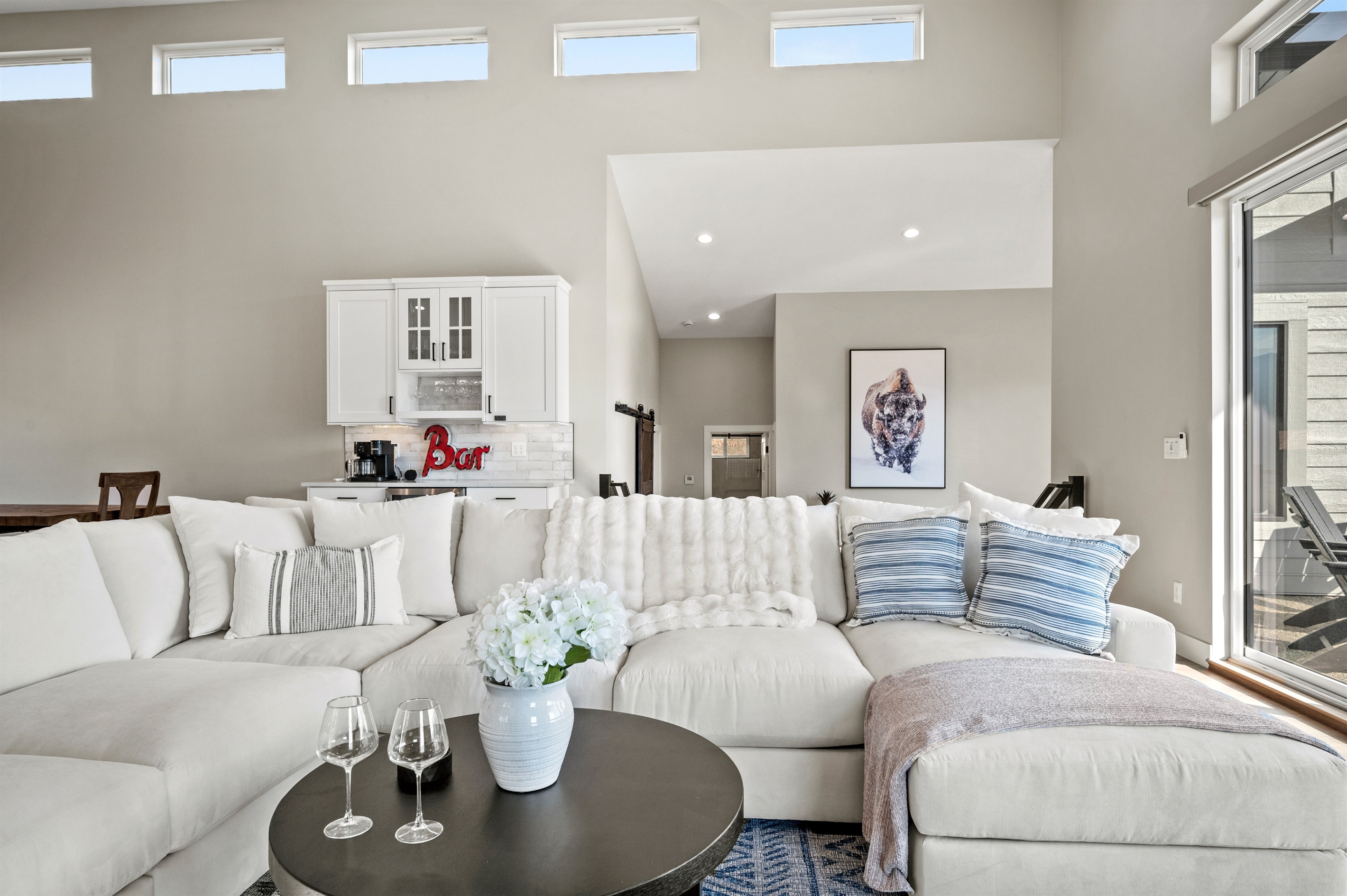 Gather in comfort and share endless conversations on plush, luxurious seating.