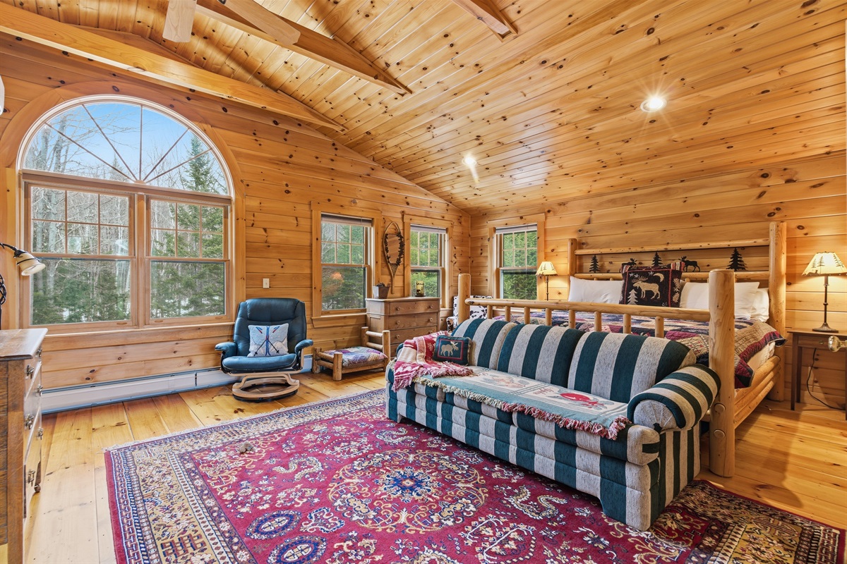 Extra sleeping space and a cozy sitting area make this suite especially versatile.