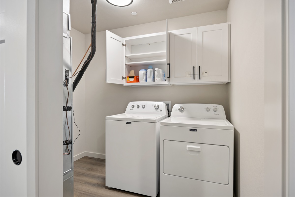 Laundry room with Free & Clear Detergent and Softener | Fabric Sheets | Laundry Sanitizer | Iron and Ironing Board