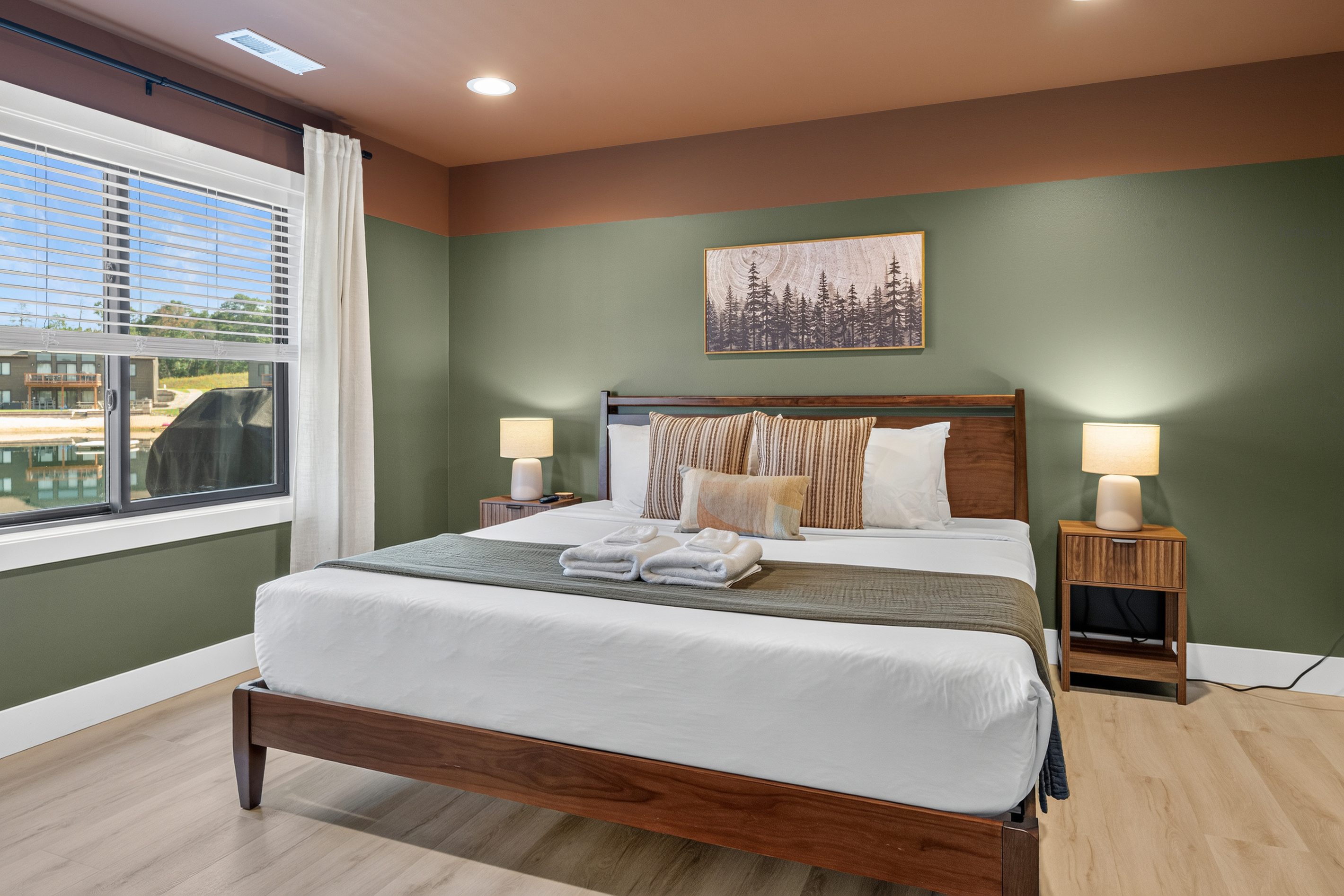 Downstairs King memory foam bedroom with smart tv and lake view