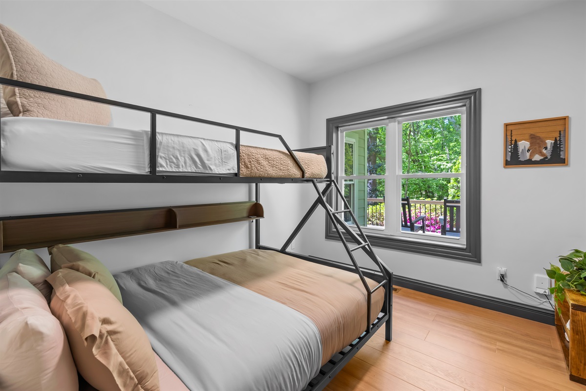 Bedroom #3 features a bunk bed with a twin over queen and a closet.