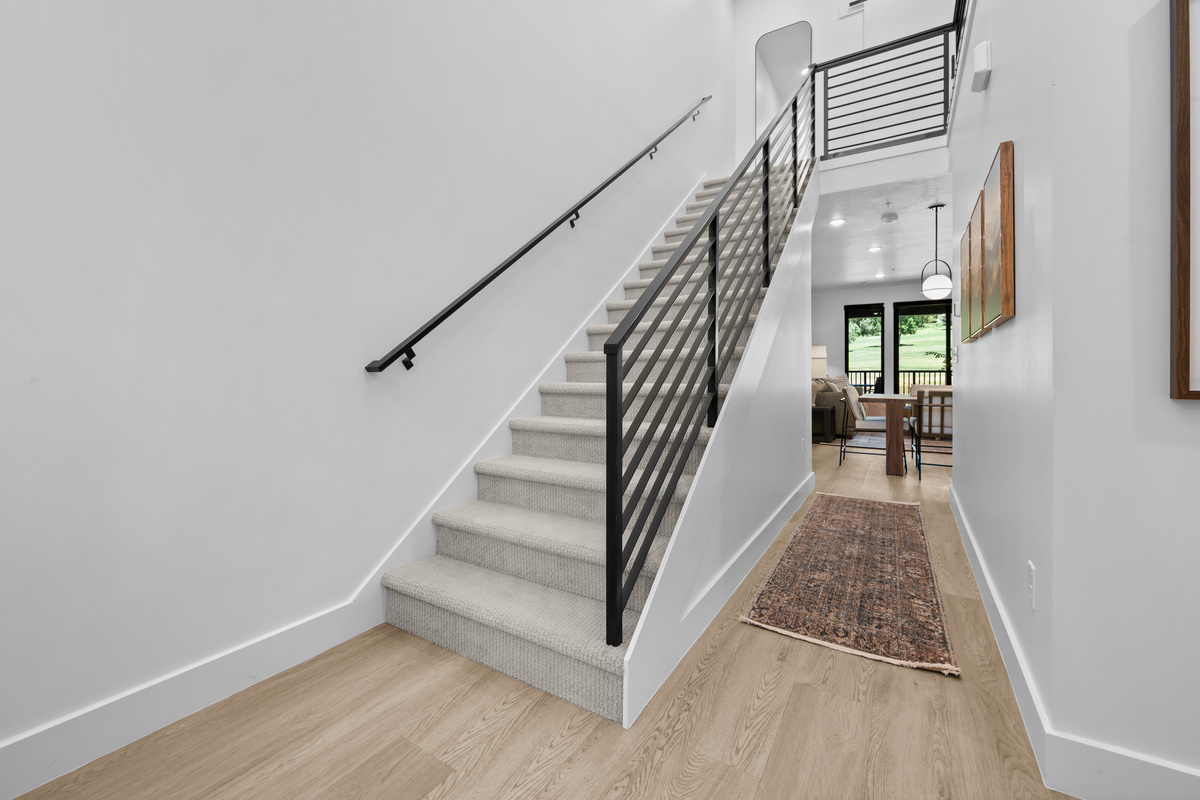 Open Spaced Entrance with the Stairs Leading to the Upper Level