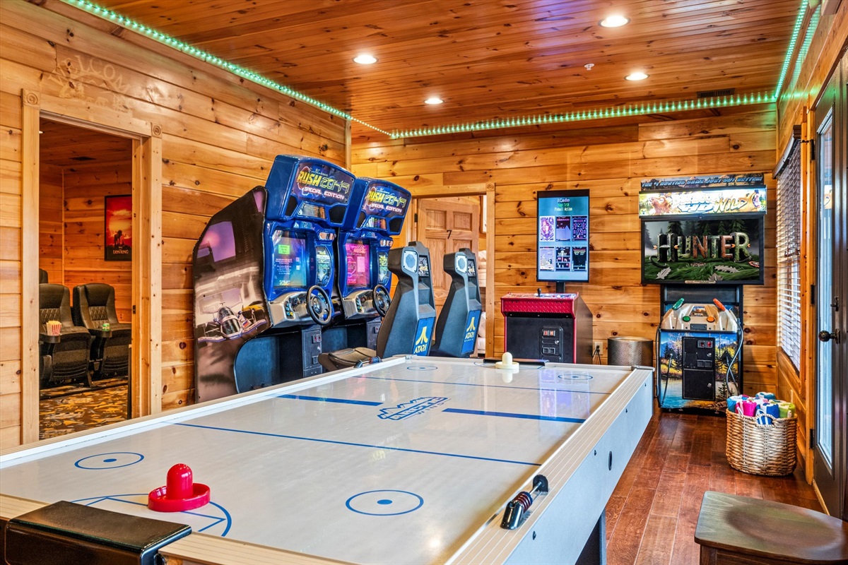 The arcade (downstairs) has racing games, air hockey, Big Buck Hunter, and more!