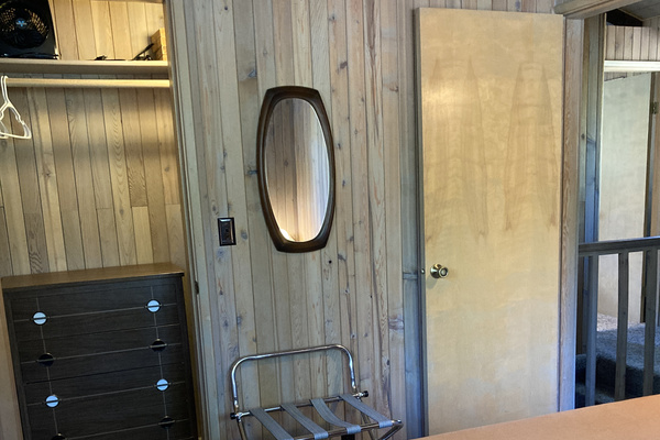 Closet and amenities in upstairs queen bedroom. 