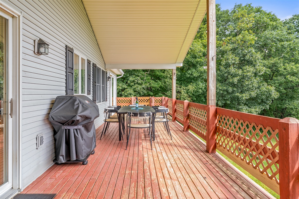 Take in treetop views from the covered deck, perfect for outdoor dining or sipping wine after a day of exploring.