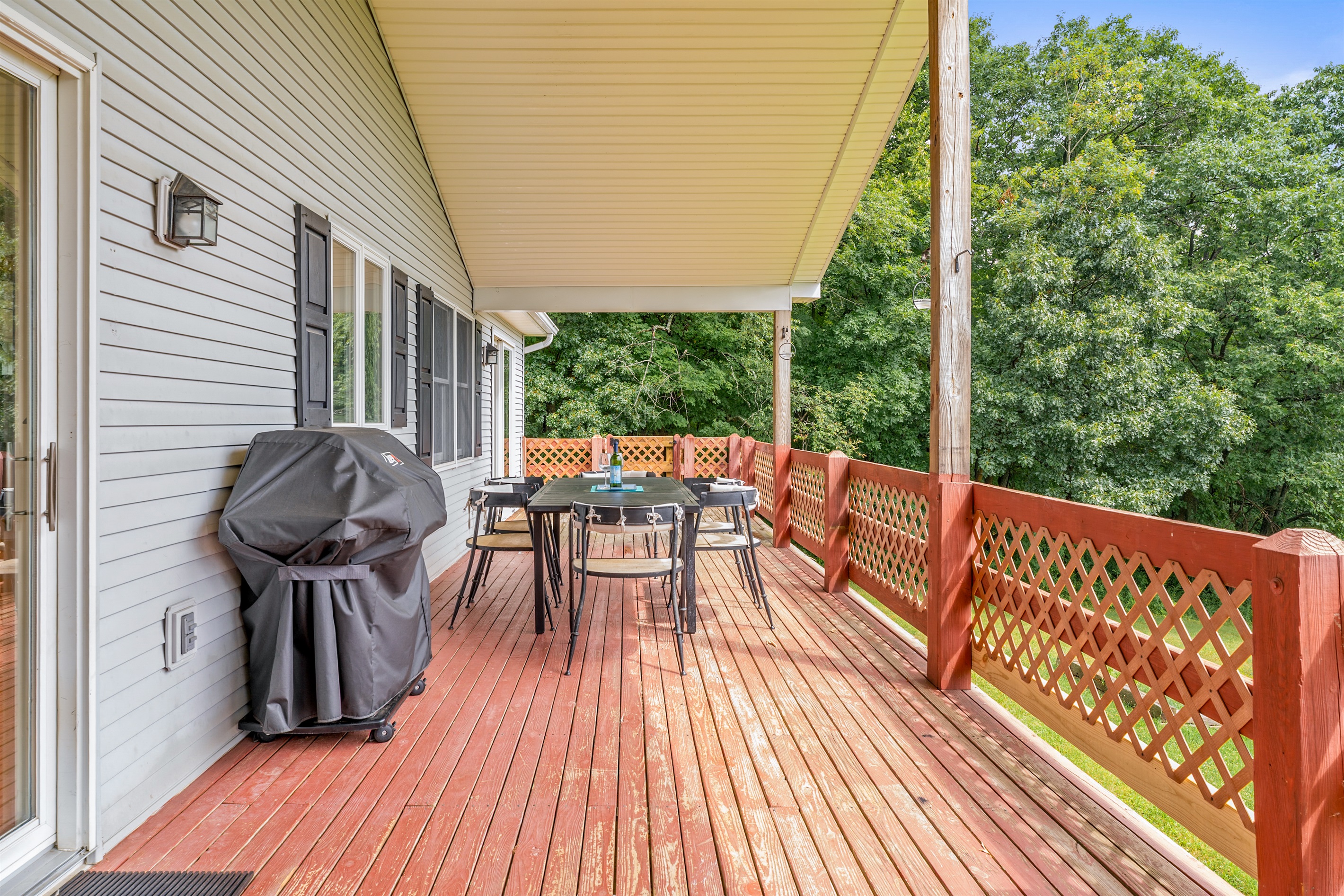 Take in treetop views from the covered deck, perfect for outdoor dining or sipping wine after a day of exploring.