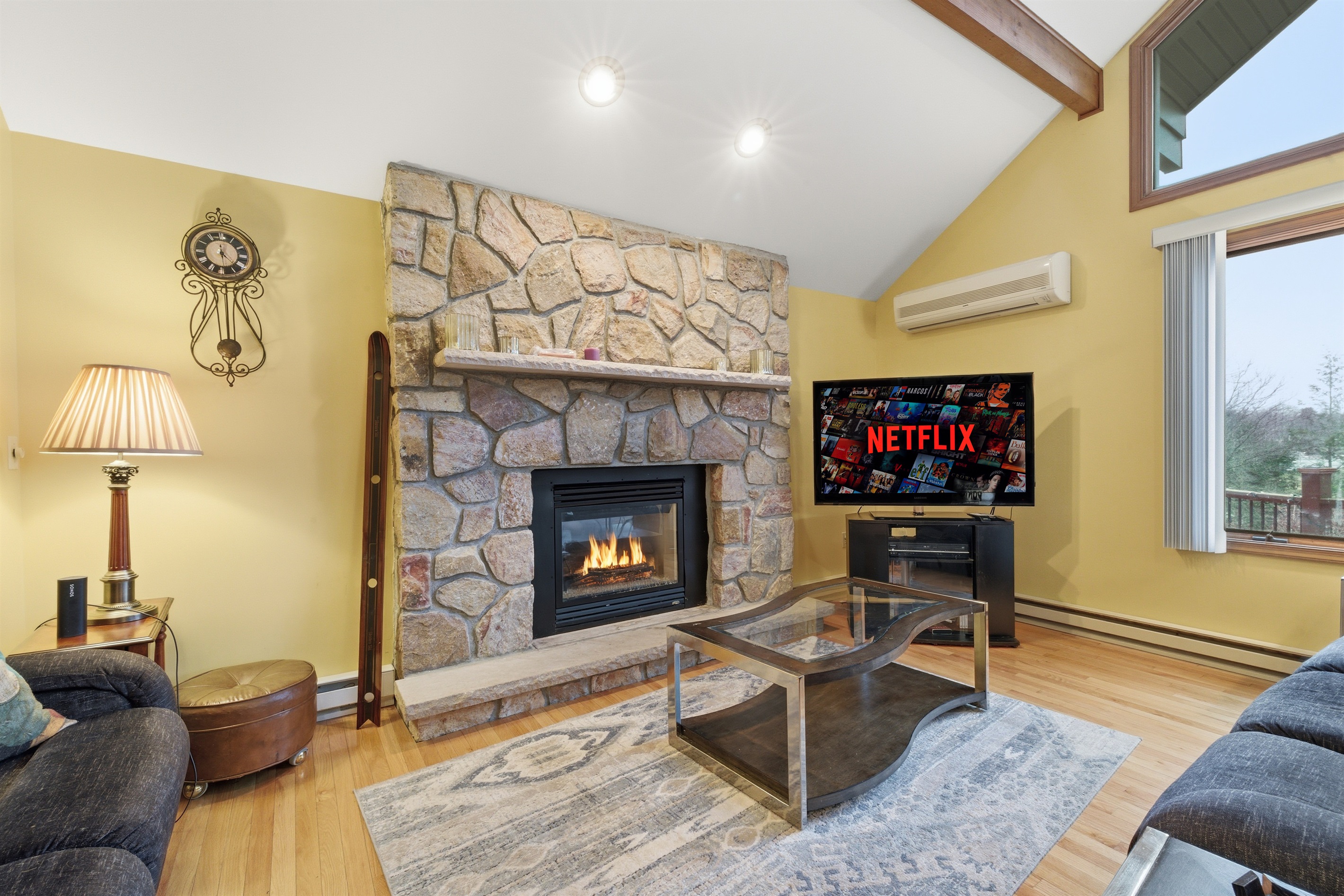 Living room with the TV and fireplace