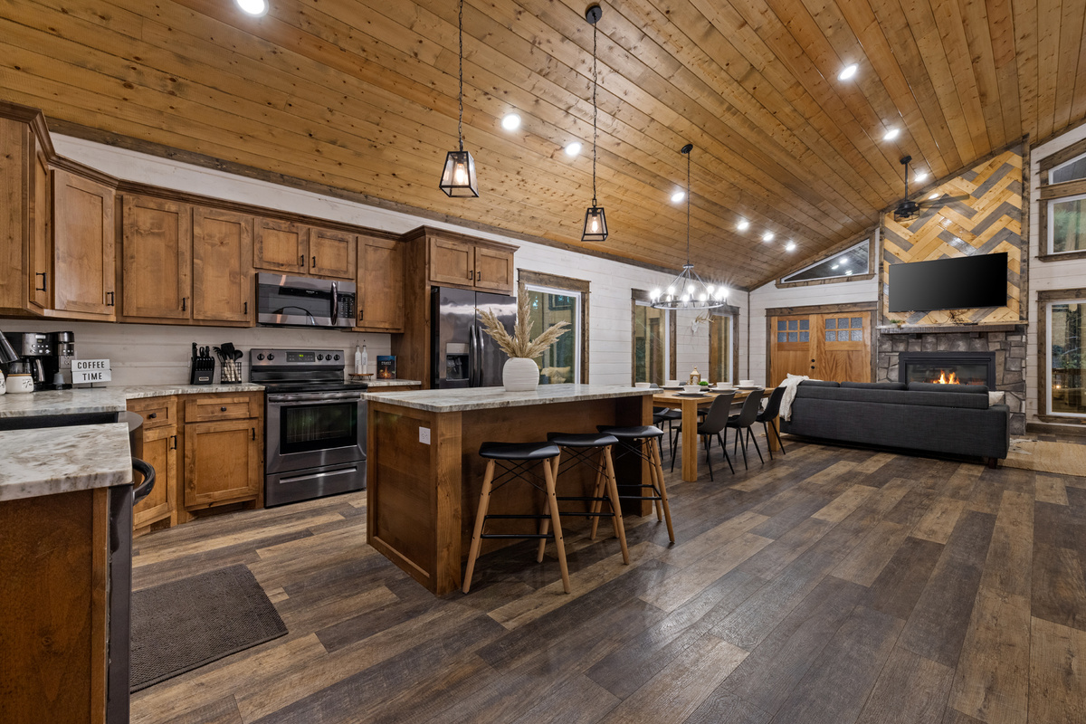 A kitchen made for actually staying in. Cook breakfast in your pajamas, make dinner together, or pour a glass of wine while everyone gathers around the island.