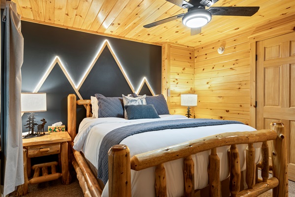 This additional queen room includes a ceiling fan and TV for extra comfort and convenience.