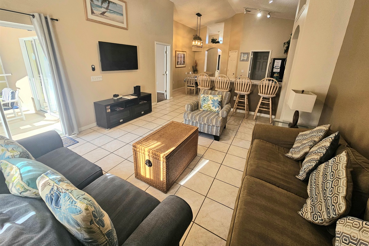 Living Room, TV, Ceiling Fan and access to Pool Deck