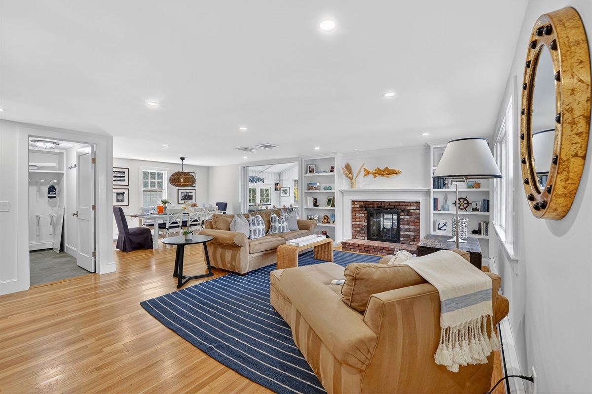 Warmth and comfort greet you in the living room with fireplace.