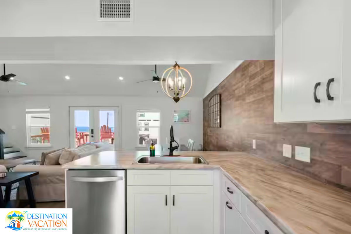Bright kitchen blends modern convenience with coastal character.