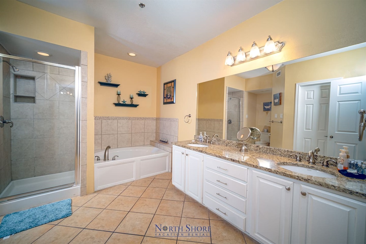 En Suite Primary Bath with Soaking Tub, Walk-in Shower, and Double Vanity