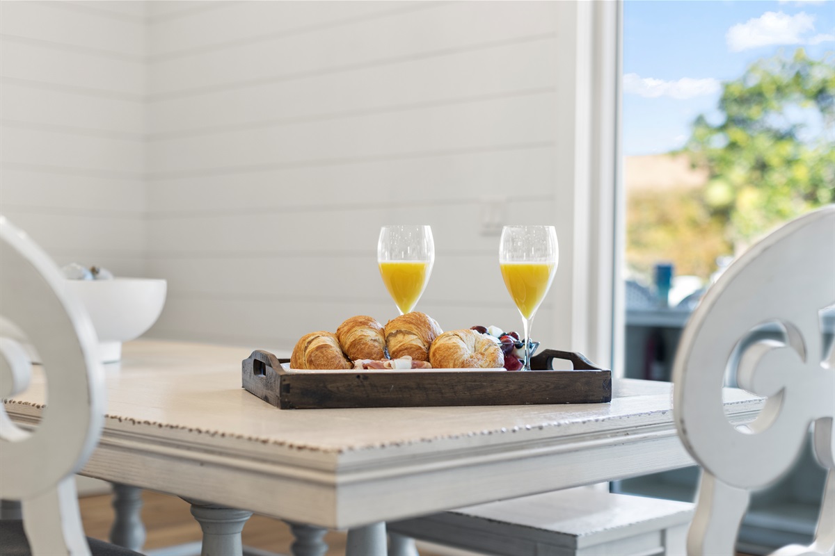 Dining room has great views that overlook the pool, hot tub and backyard