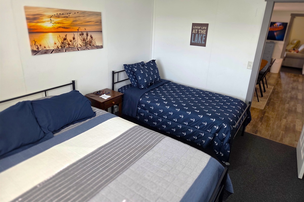 Bedroom 2 - has a queen & twin bed plus ceiling fan.