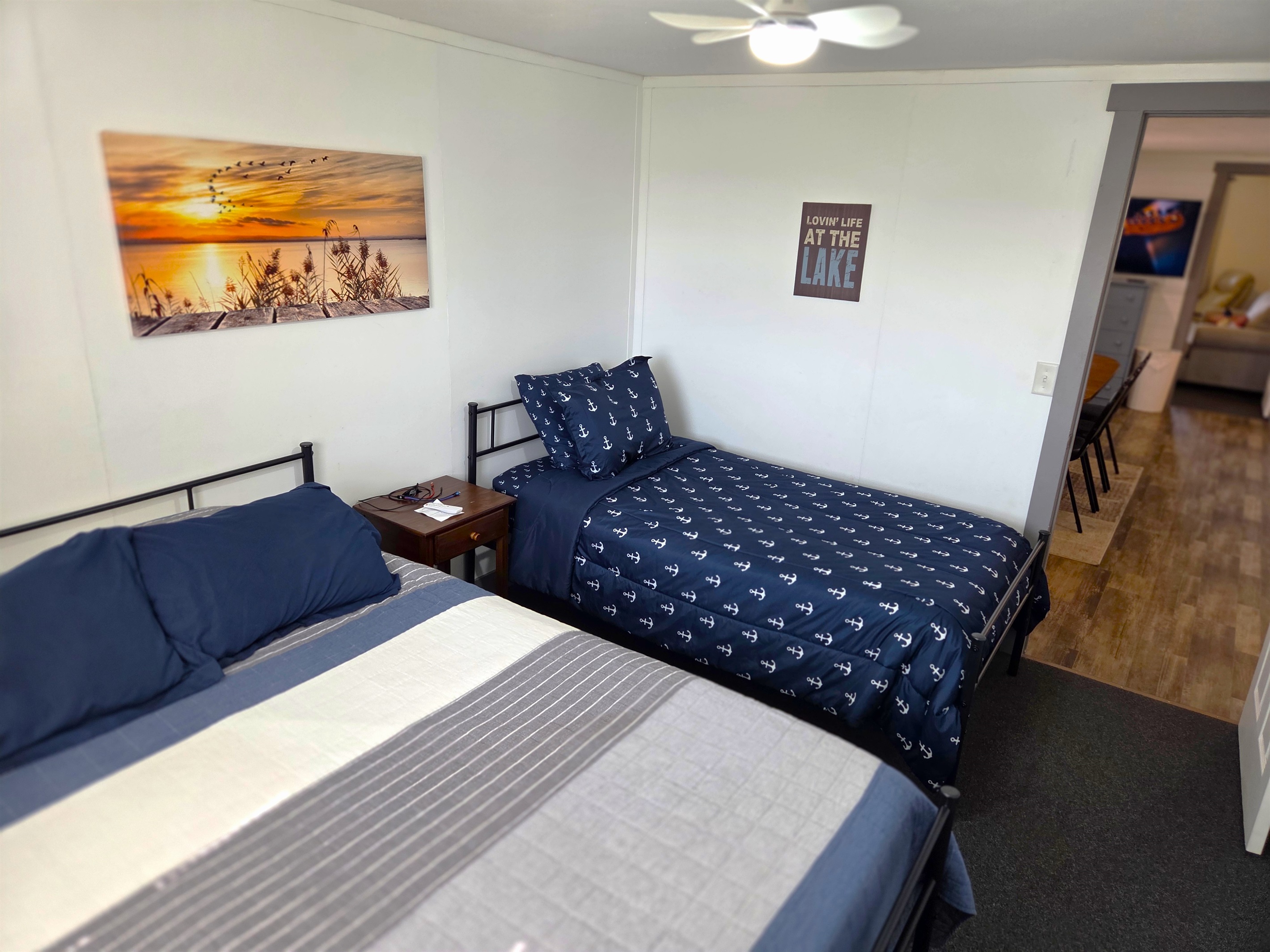 Bedroom 2 - has a queen & twin bed plus ceiling fan.