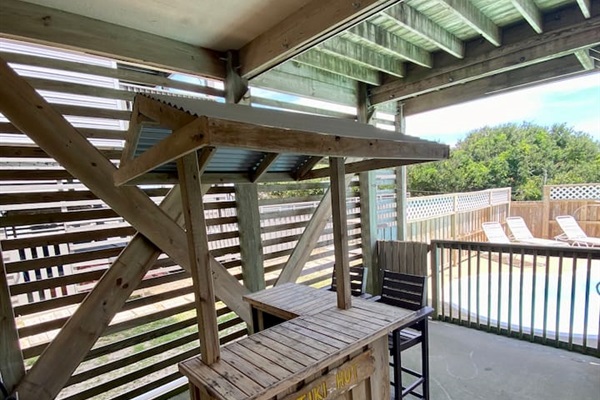 Shady tiki bar, always vacation time here!