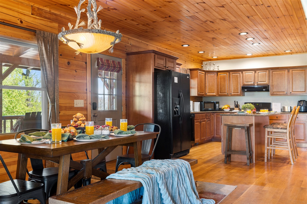Dining Area: Gather around for delightful meals with stunning views and rustic charm!

