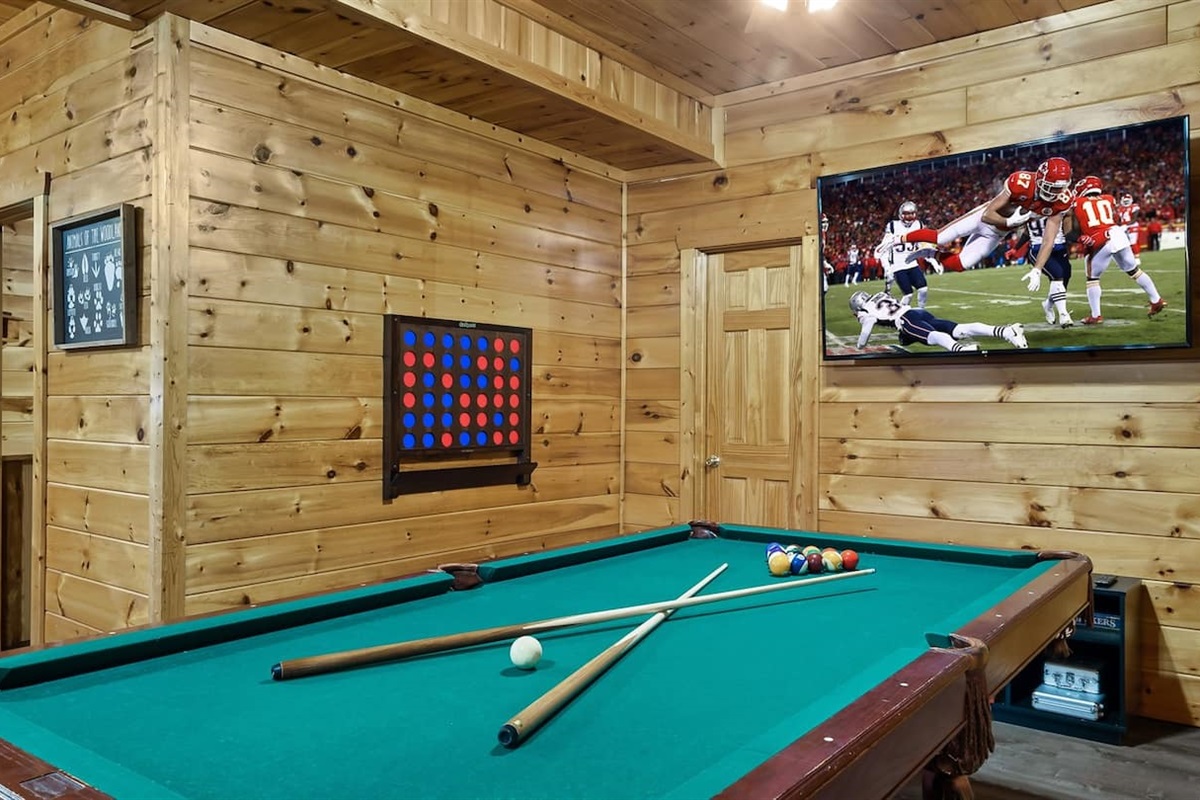Pool table, shuffleboard (in loft), and multicade — game on