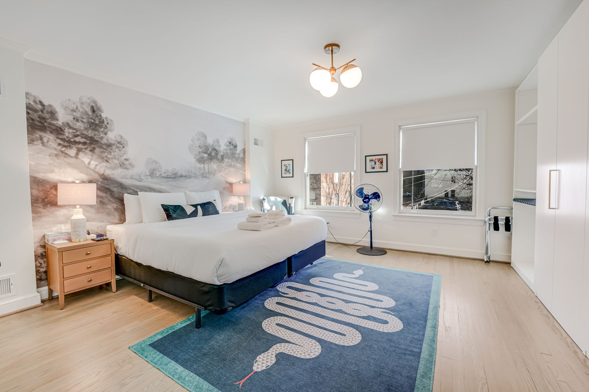 Main Bedroom: King Bed, Windows Overlooking Quiet Rear Patio.