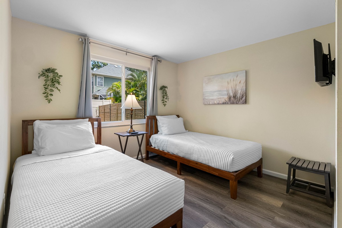 Whether used by kids, friends, or solo travelers, this twin bedroom offers a peaceful and comfortable retreat, making it a versatile addition to the home’s layout.