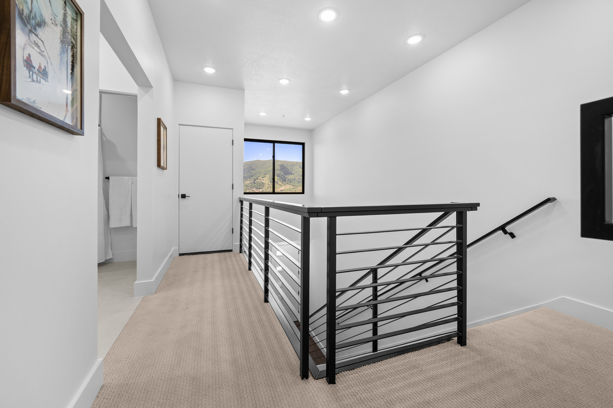 Open upper hallway overlooking the main living area below.