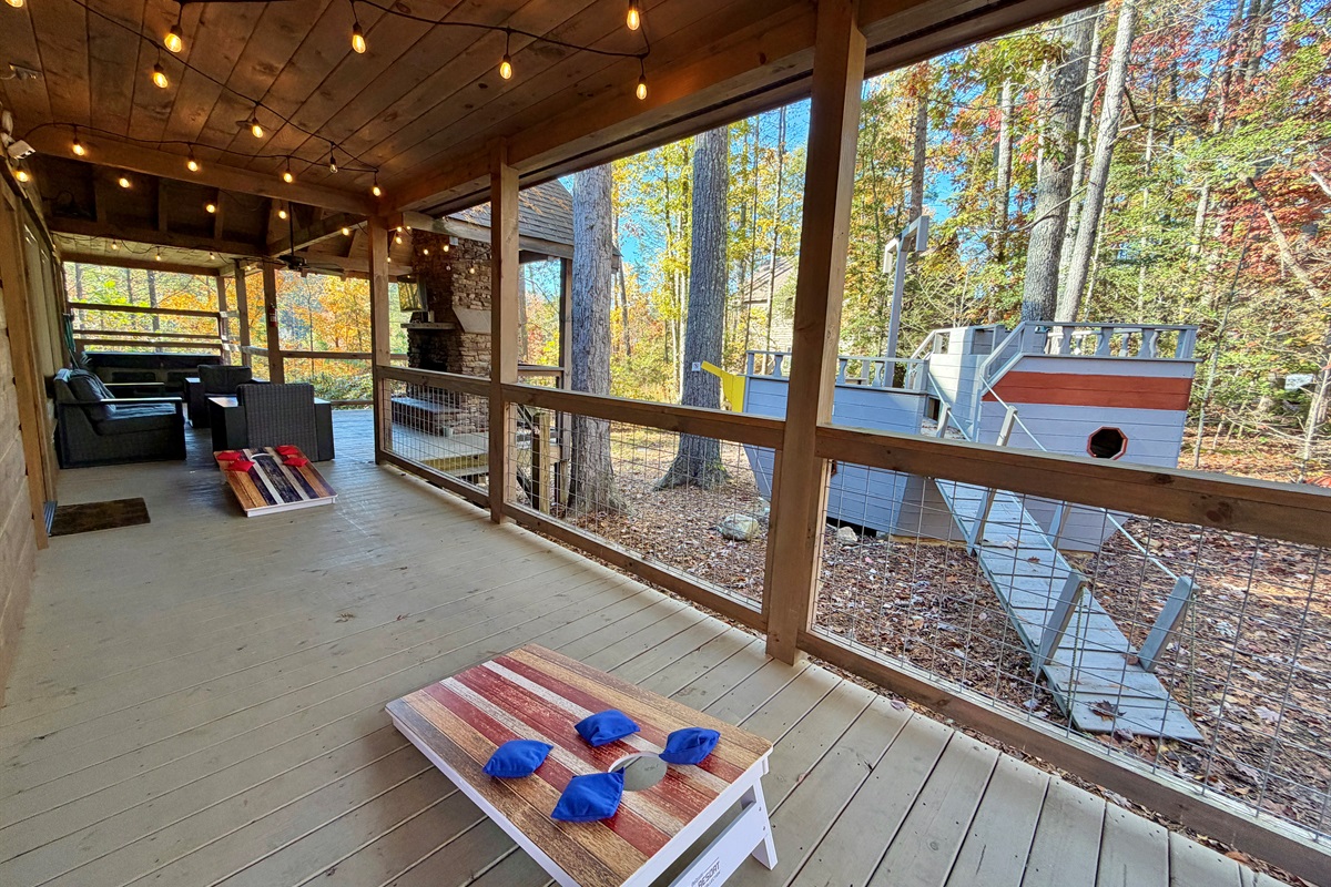 Relax on the deck with a game of corn hole