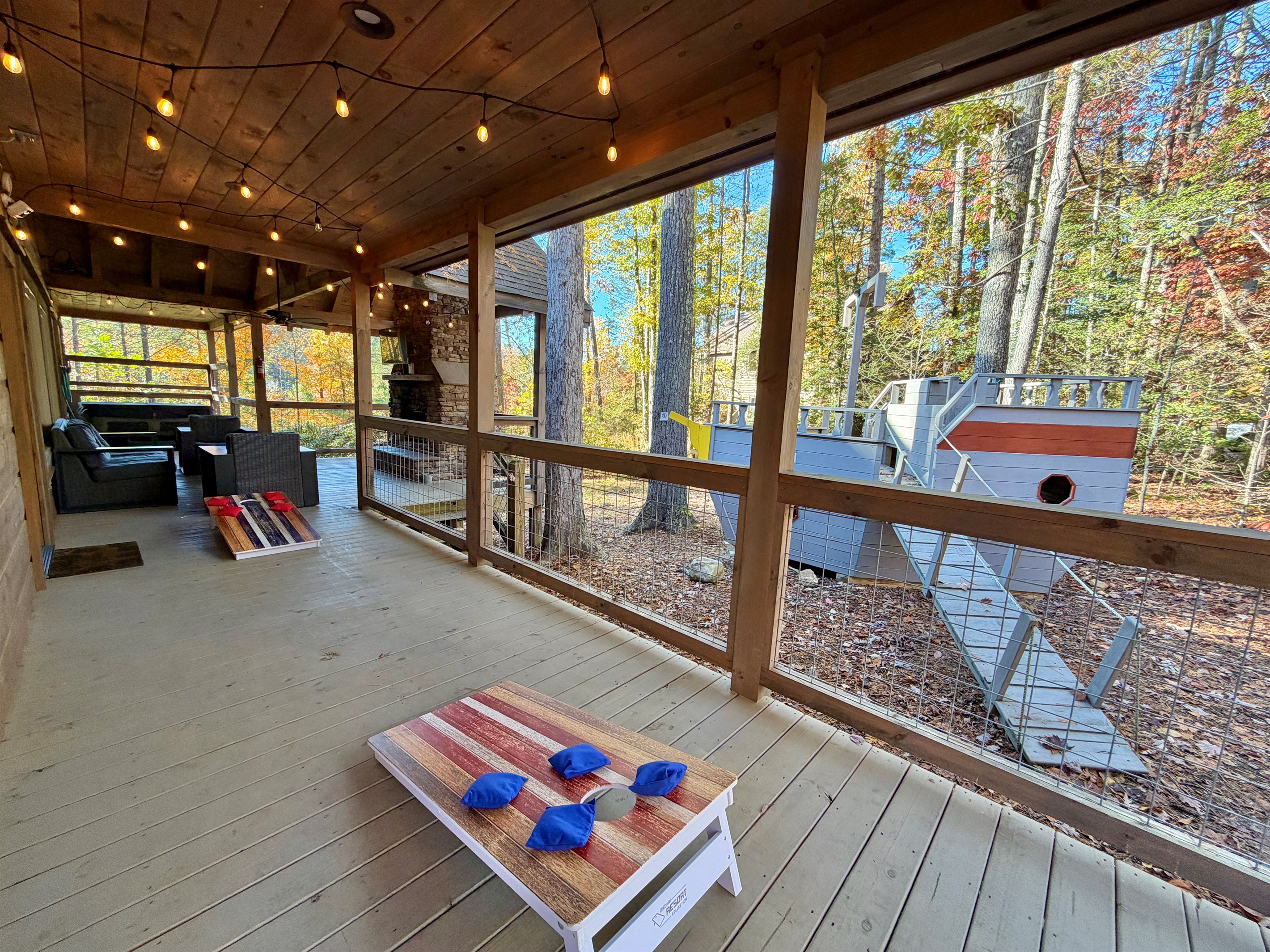 Relax on the deck with a game of corn hole