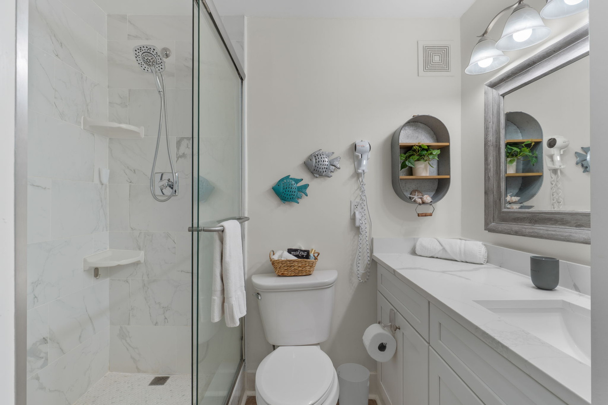 Bathroom with tiled walk-in shower