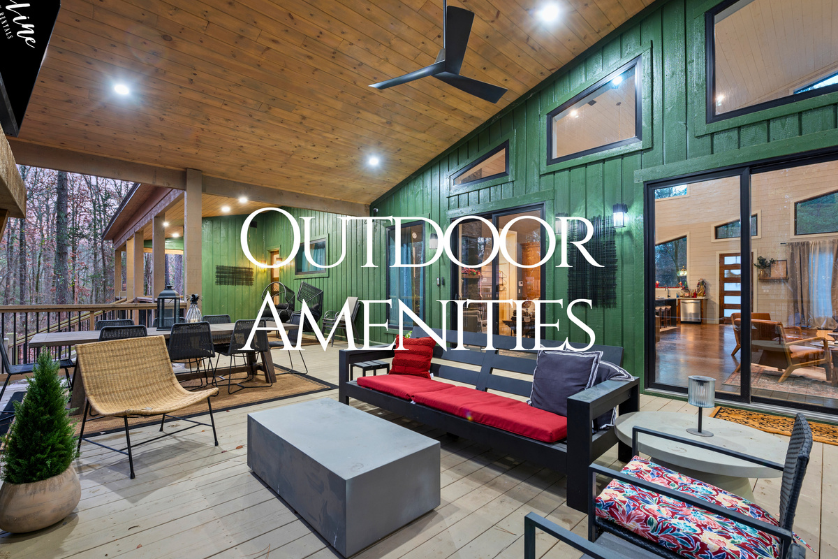 The expansive outdoor deck includes plenty of seating, offering a perfect spot to enjoy fresh air and scenic views.