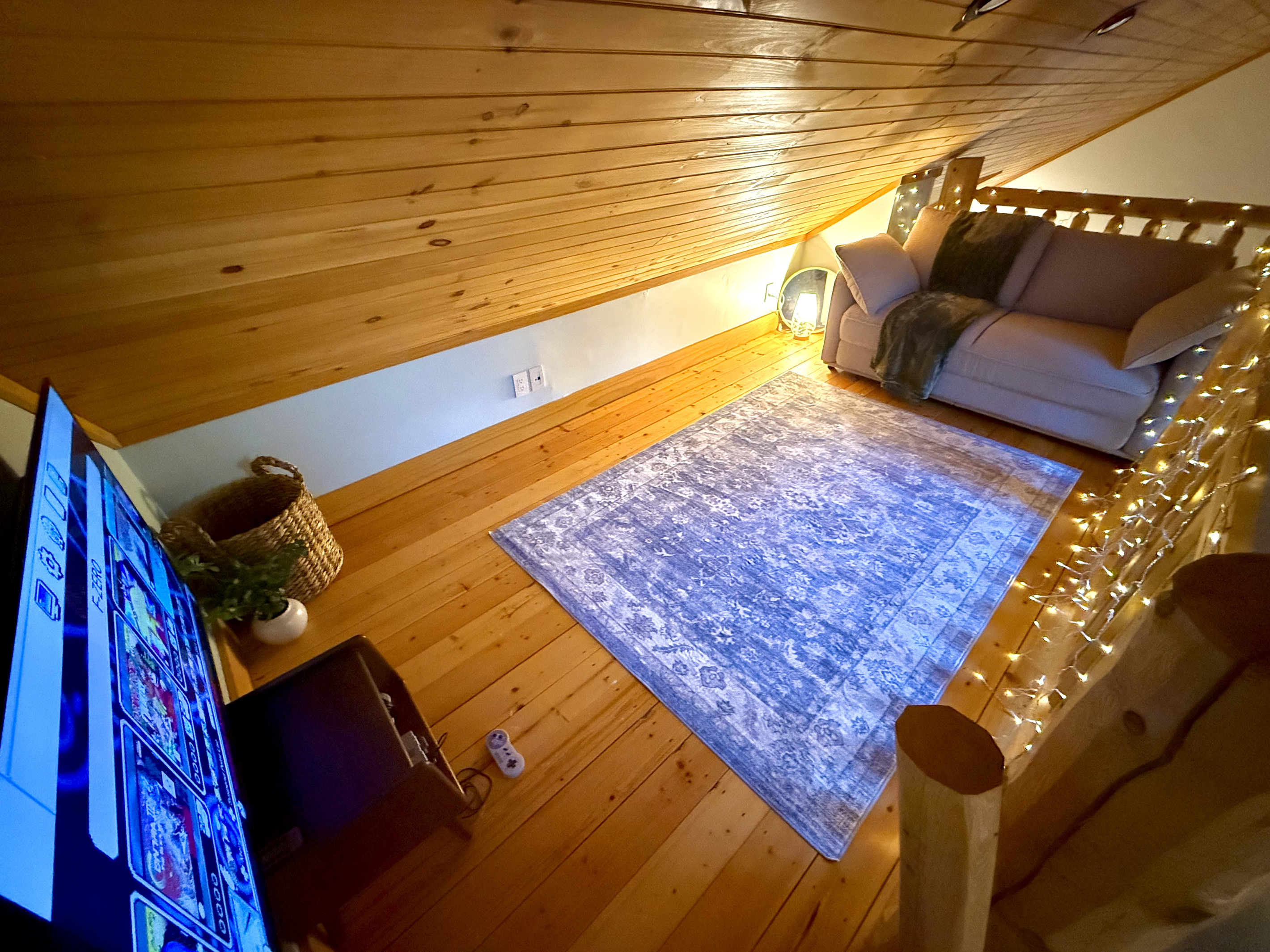 Fun loft hangout space with retro gaming system