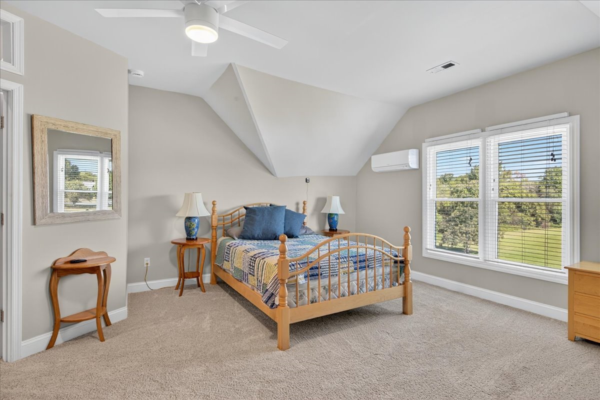Relaxing bedroom with cozy bedding.