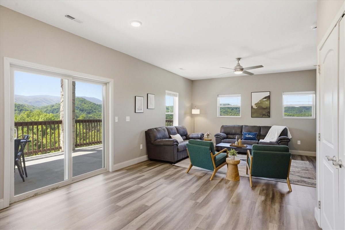 Leave the door open and let the space flow—kitchen to living room to porch, all connected. It makes going in and out feel natural, like the outside is just part of the room.