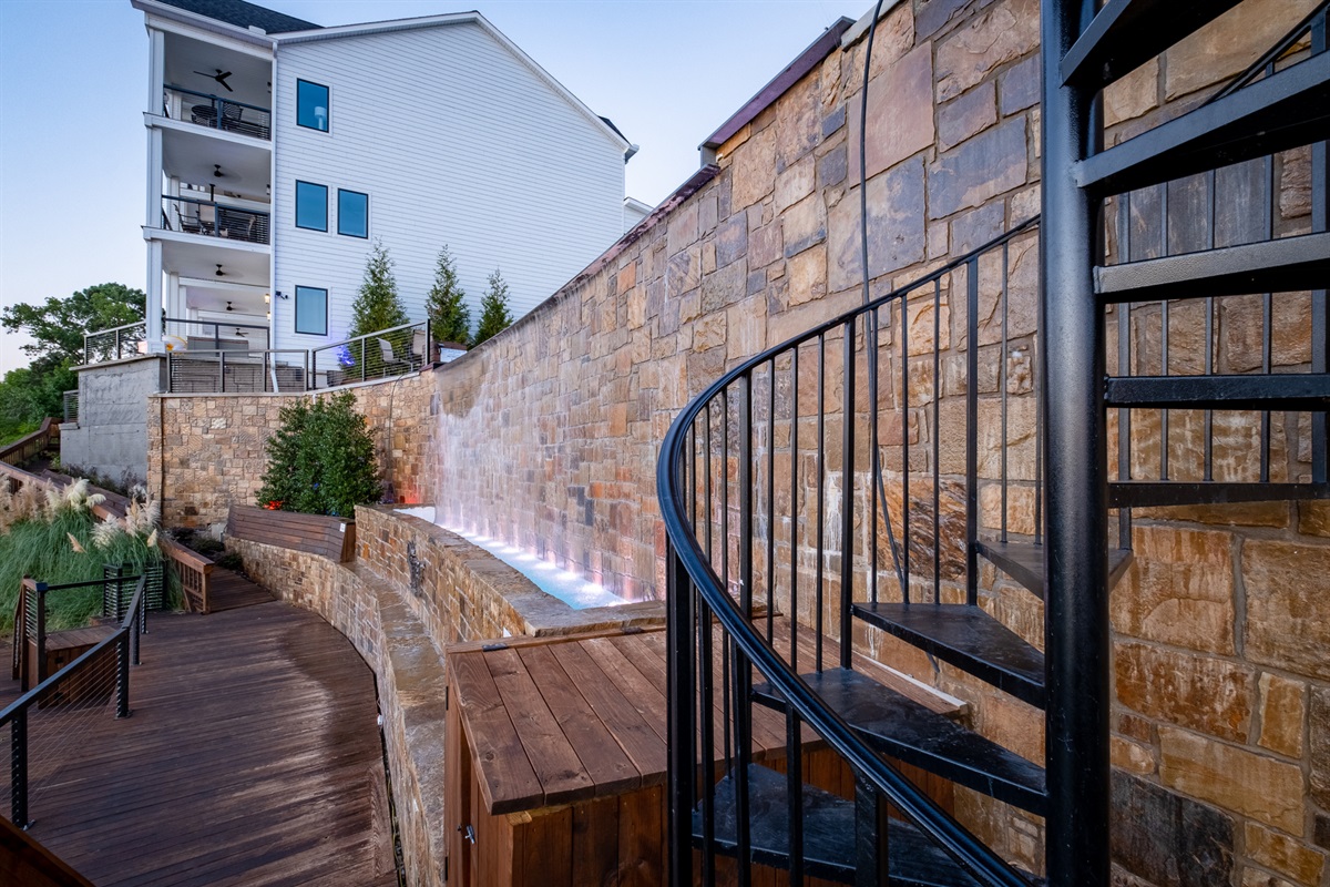 Enjoy the Soothing Sounds of the Water Cascading from the Infinity Pool