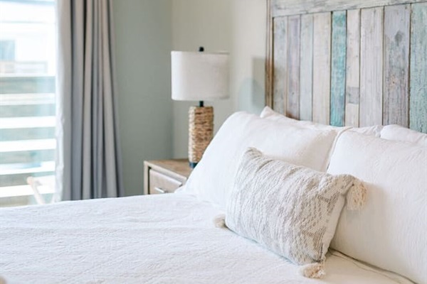A cozy and inviting bedroom designed for restful nights after beach days.