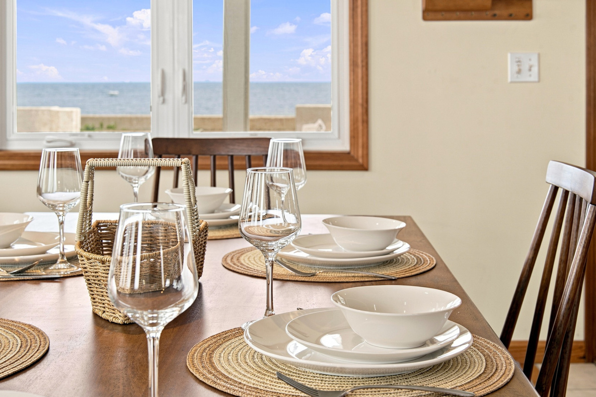 Ocean-view dining space perfect for family meals, game nights, or morning coffee.