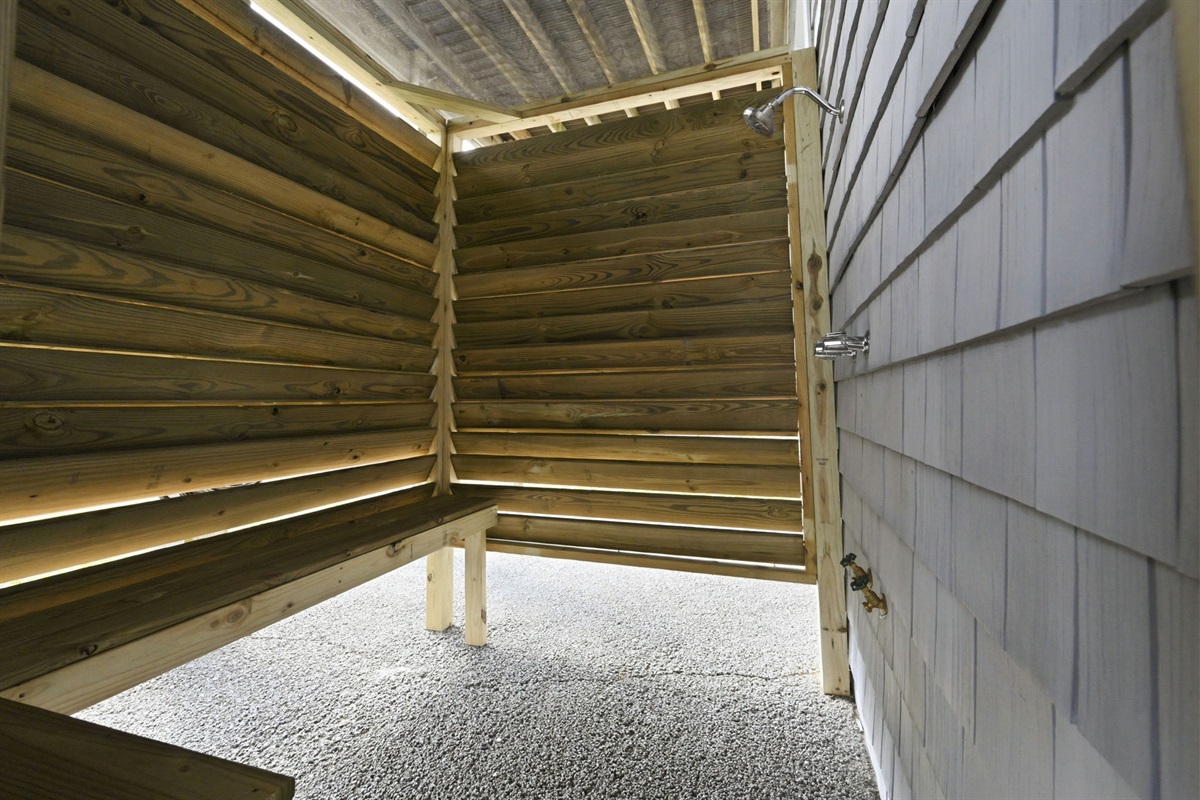 Rinse off after a beach day in the private outdoor shower with changing area