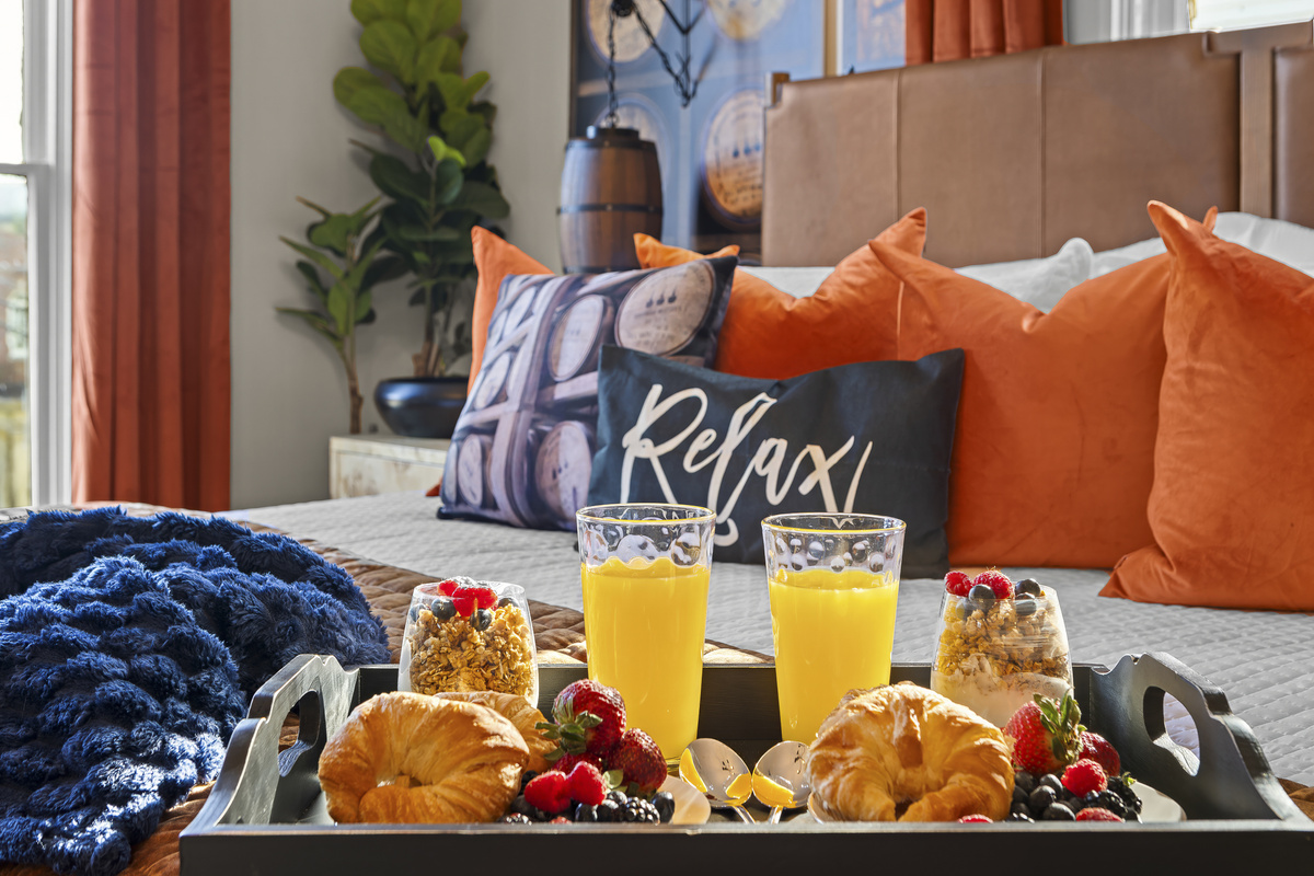 Enjoy breakfast in bed in the Woodford Reserve Room, complete with fresh fruit, orange juice, and a flaky croissant to start the day right.