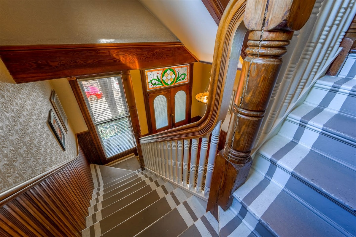 Dramatic stairway leading up to your private dwelling.