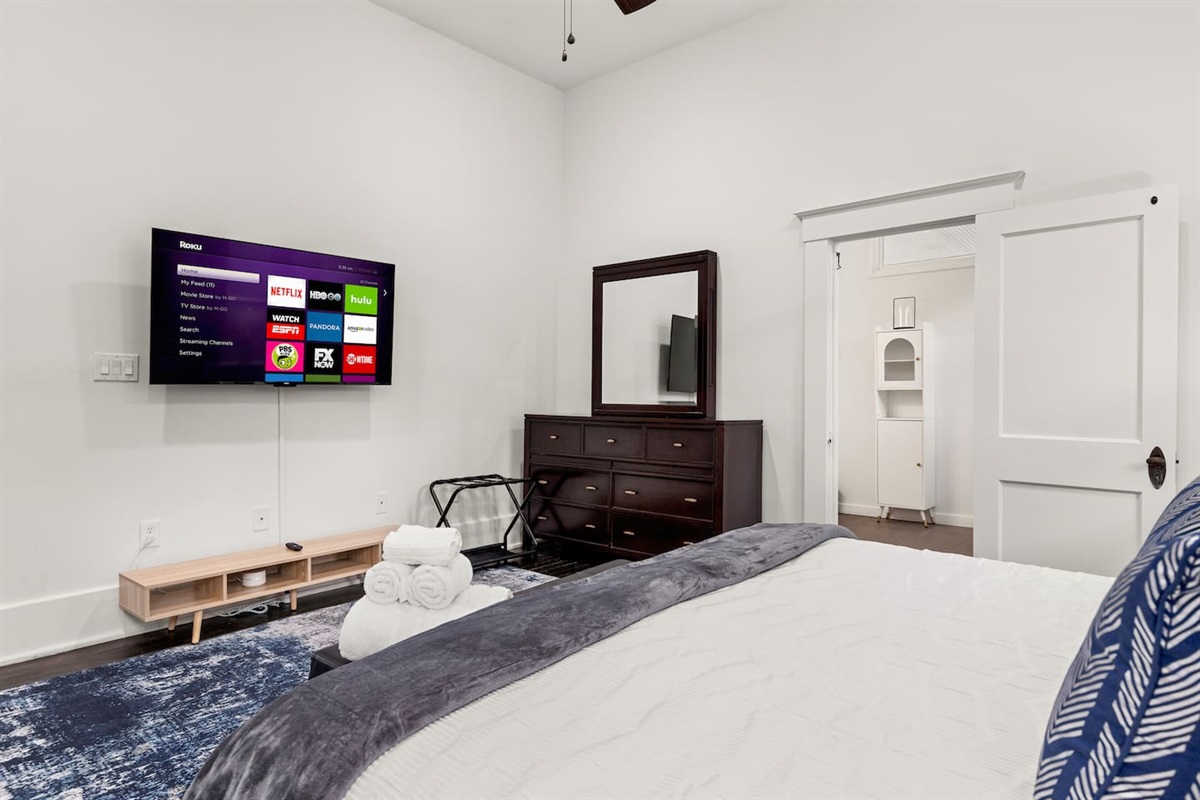 Unwind in style with our cozy, well-appointed bedroom that promises a good night's sleep and your favorite shows just a click away.