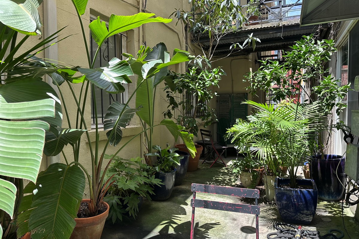 Peaceful, landscaped space right downstairs.