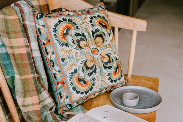 Curated Hill Country textiles and handcrafted ceramics at Gaines Ranch on the Square &mdash; modern Western character woven through every space.