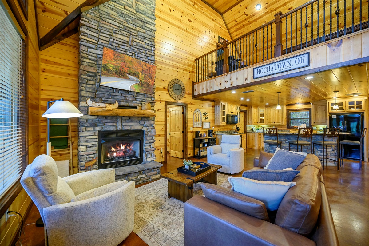 🪵 Curl up by the stone fireplace and unwind