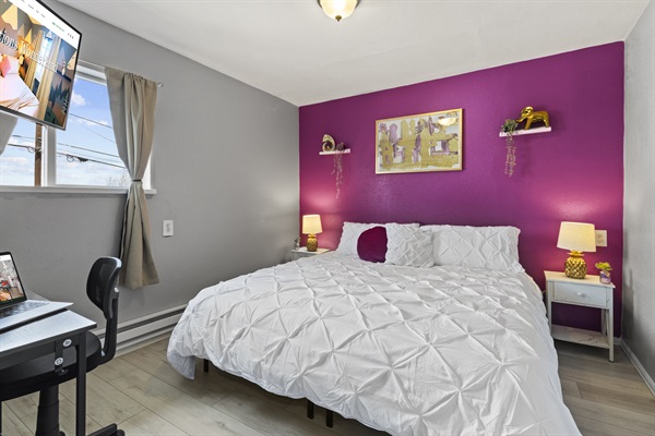 Immerse yourself in the lap of luxury in our king bedroom, where regal comfort meets cutting-edge entertainment through a Roku TV.
