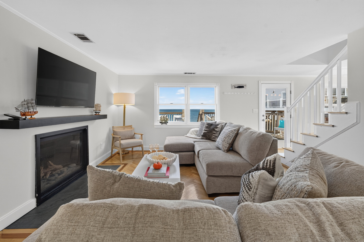 Bright, comfortable living space with ocean views and plenty of room to relax after a day at the beach.