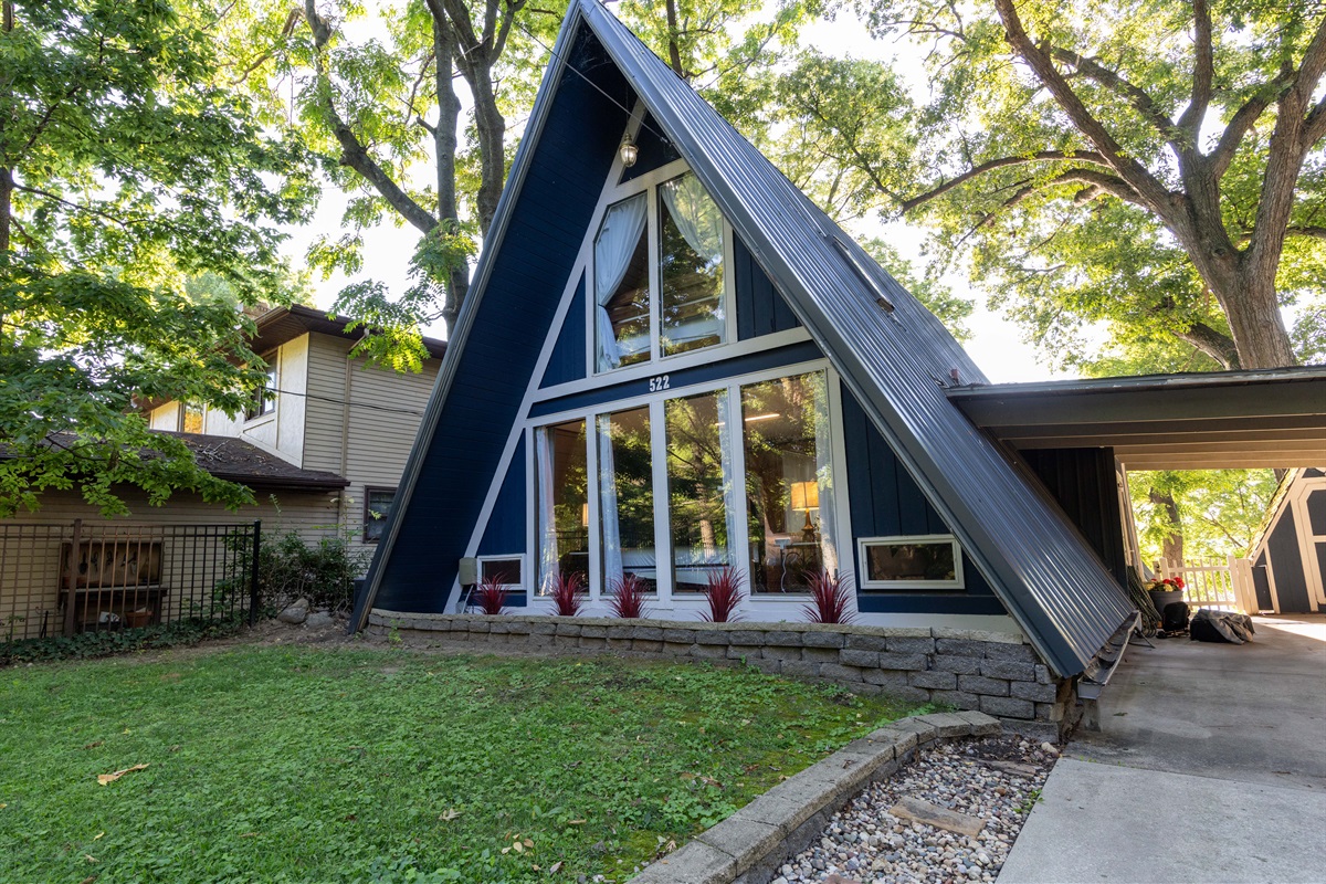 Larger than it looks, the A-frame style cabin located right on the lake evokes a quiet sense of calm as soon as you pull in.
