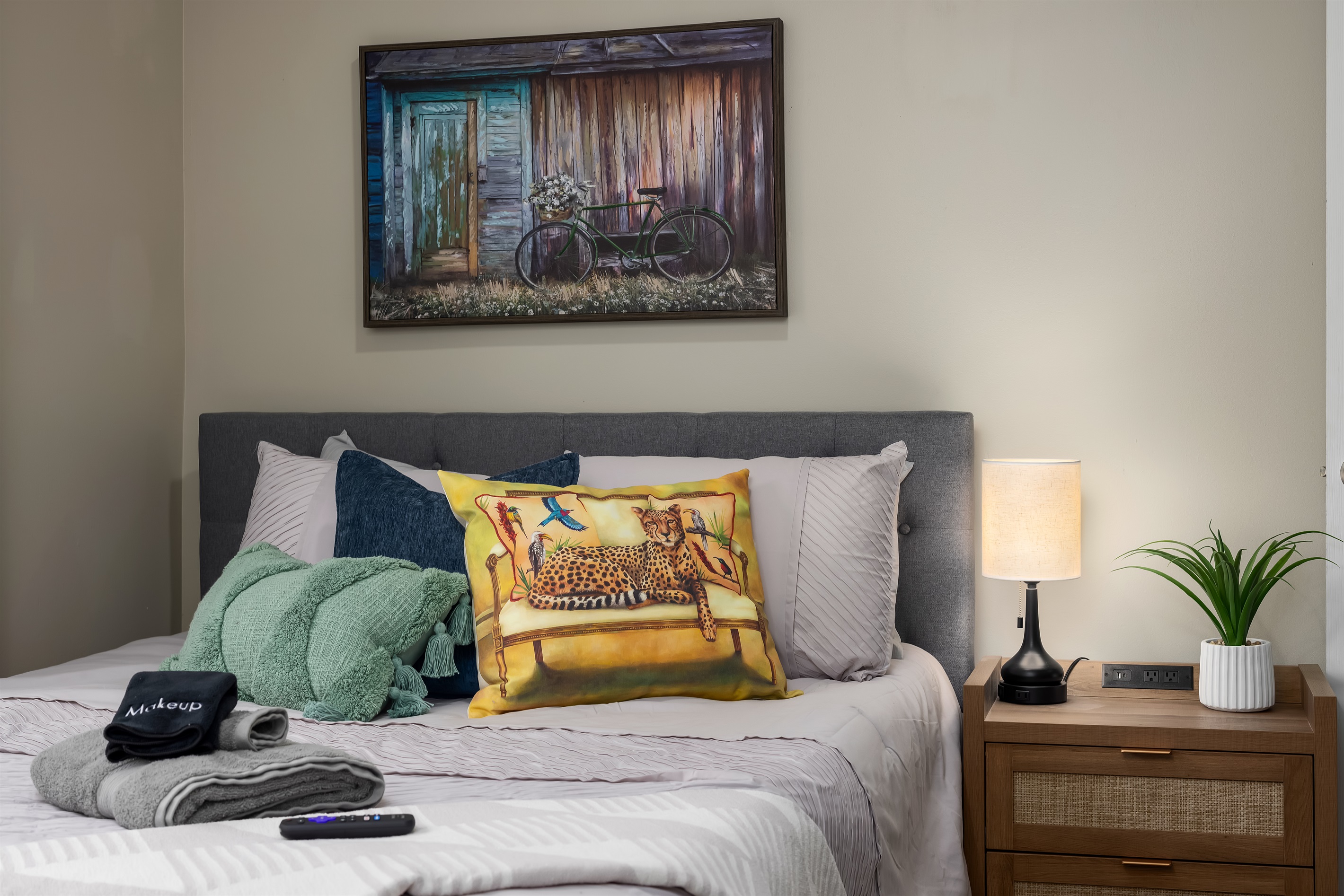 Message us now for our seasonal promotion! Slumber in Style: Rest like royalty in our vibrant Queen bedroom – where even the pillows are a work of art!