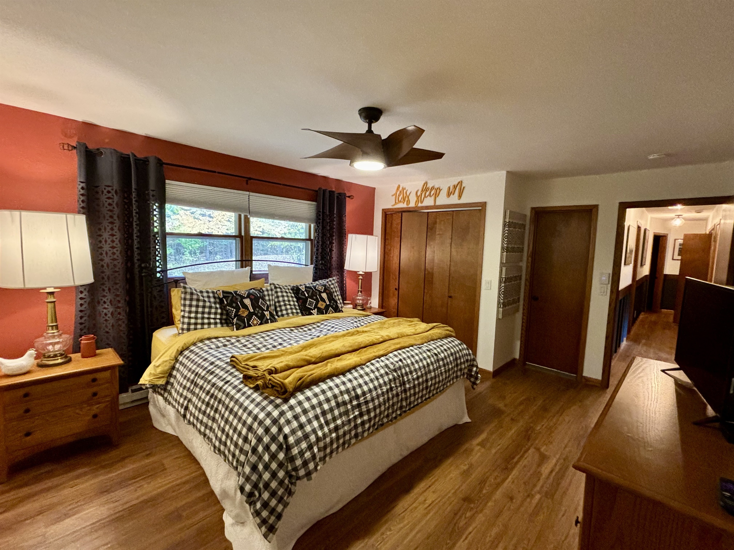 King Bed, Ceiling Fan, Closet with Luggage Rack, door to Master Bath