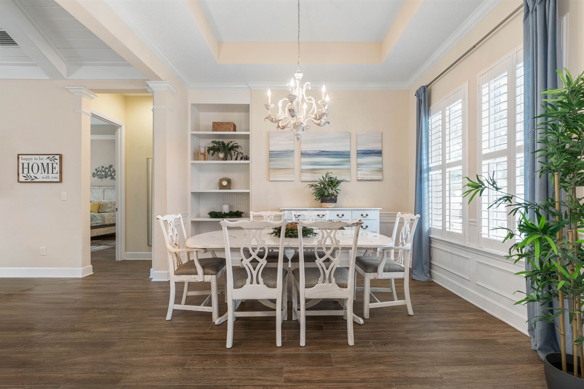 Gather under the chandelier for pancakes before the beach, come back sun-kissed for dinner and stories, and let this bright coastal dining room turn everyday meals into the kind of vacation moments everyone remembers.