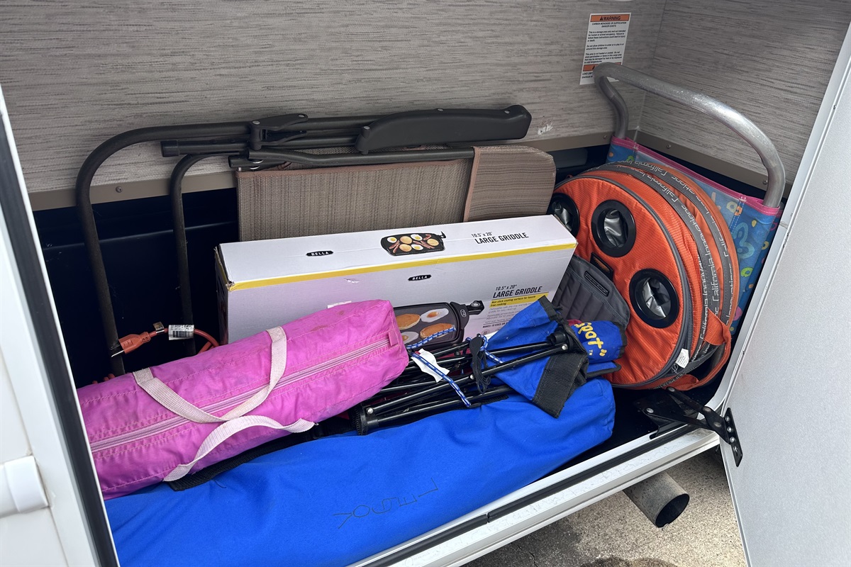 Some extra chairs, cooler, griddle, etc.